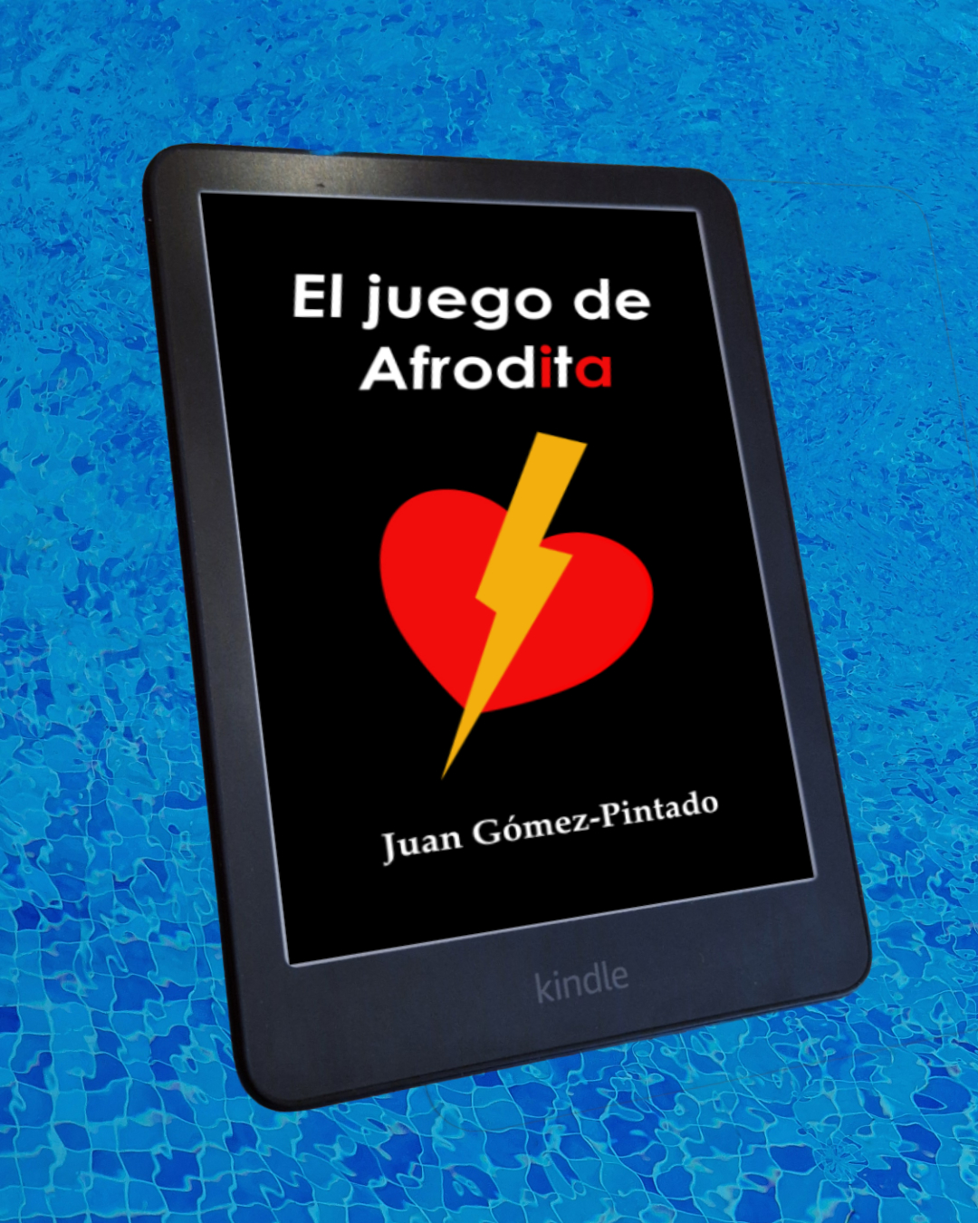 Fotomontaje de un kindle con la portada de "El juego de Afrodita" y piscina de fondo